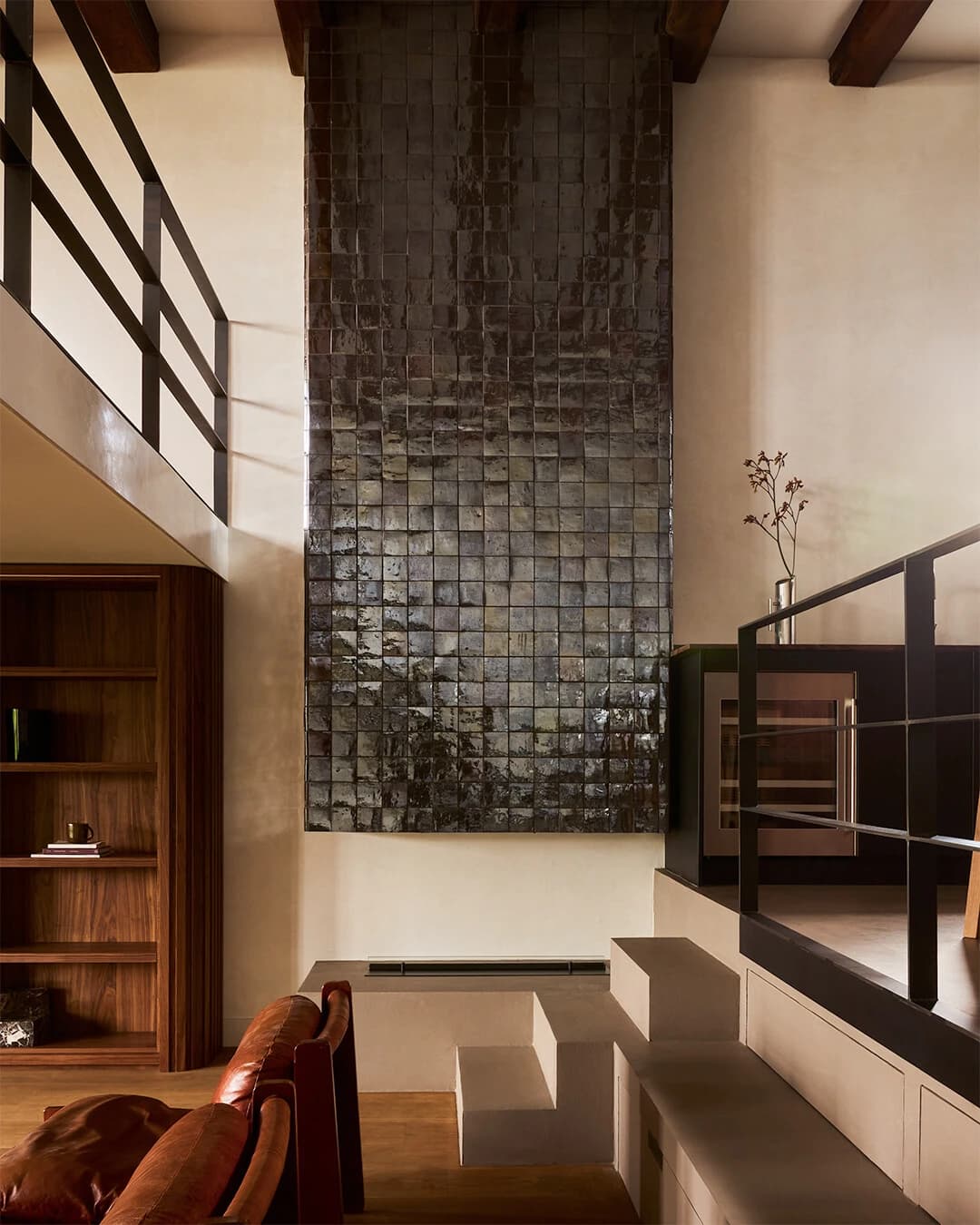 Zellige cladding on a modern fireplace.