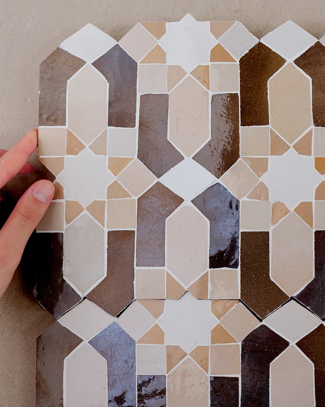 Pre-positioned Zellige panels make complex decorative layouts easier to install.