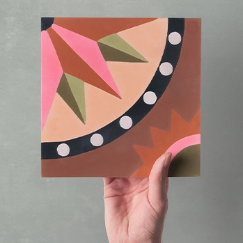 hand-holding-colourful-cement-tile